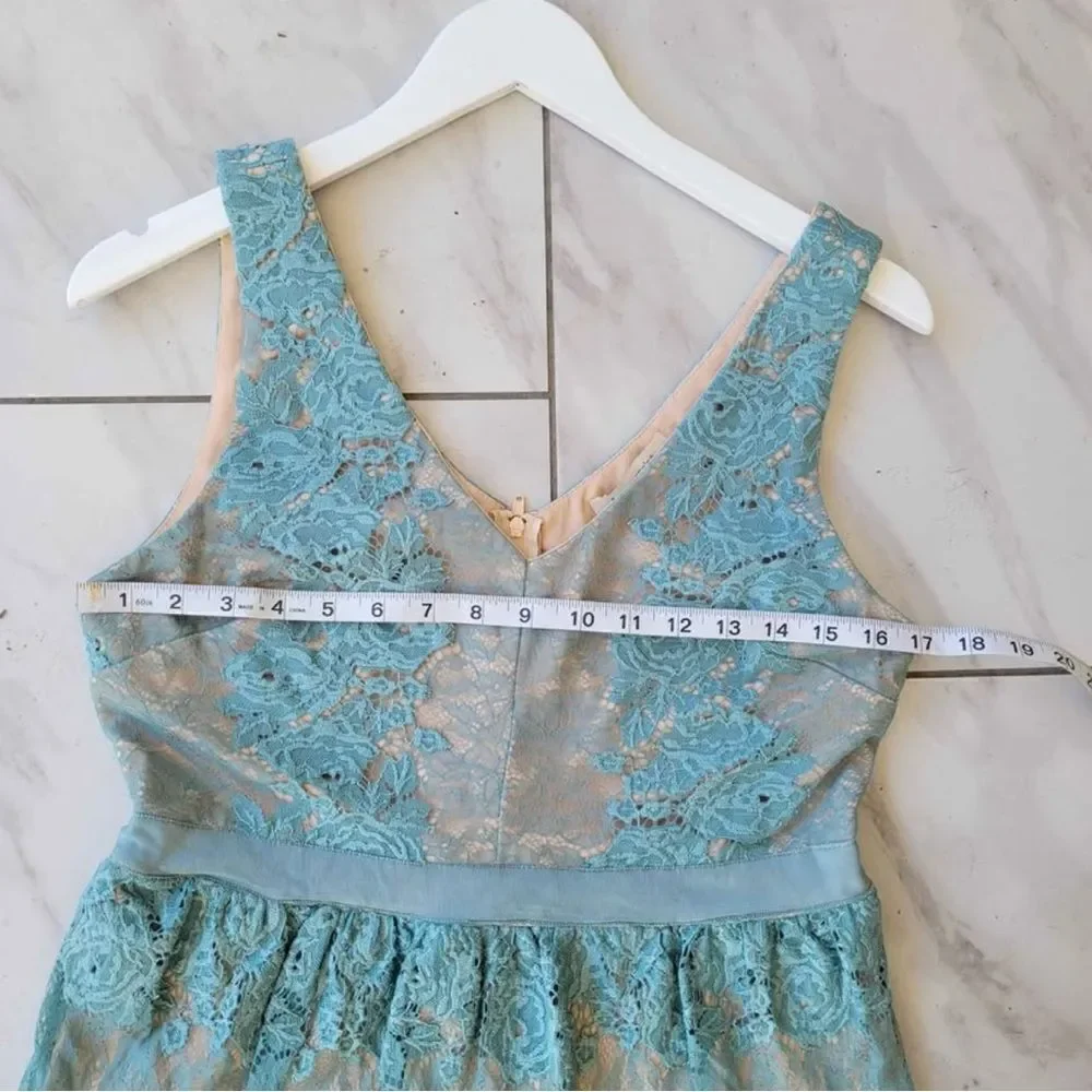Francesa’s Turquoise lace dresss